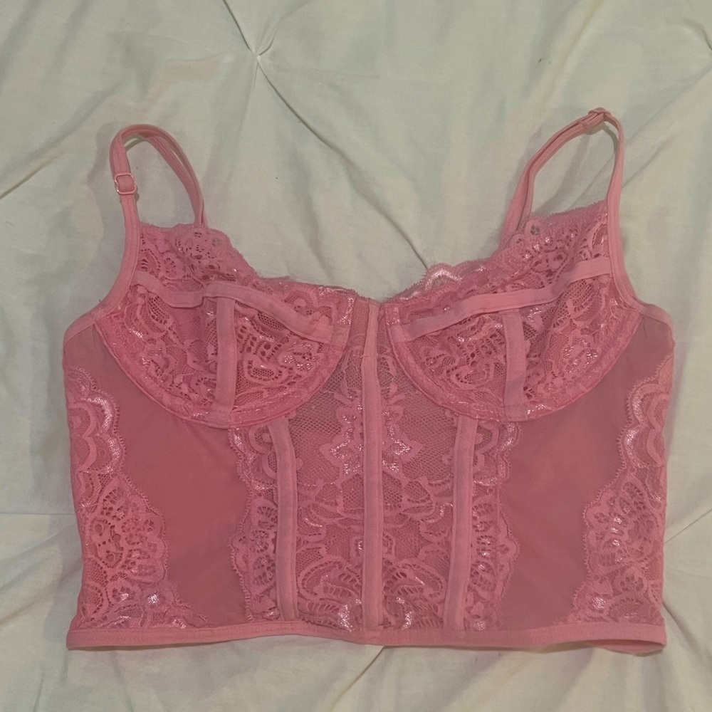 LIKE NEW! Pink corset top with adjustable straps. Only worn once!
